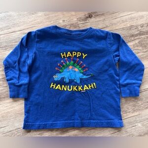 Happy Hanukkah graphic tee featuring Dino with Candles